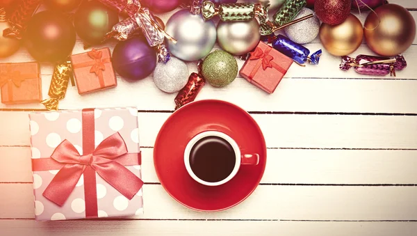 Christmas gifts toys and cup — Stock Photo, Image