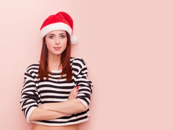 Mujer en Santa Claus sombrero — Foto de Stock