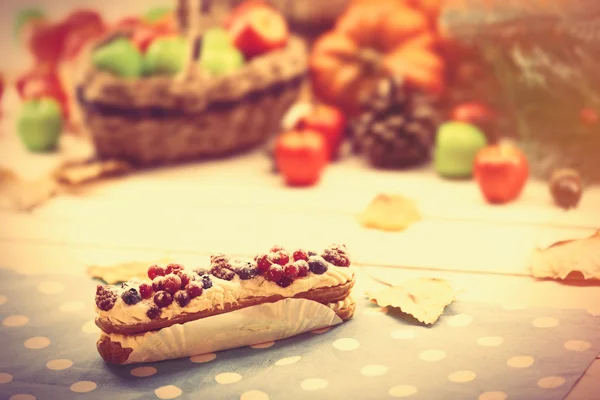 Eclair, apple, pumpkin and other — Stock Photo, Image