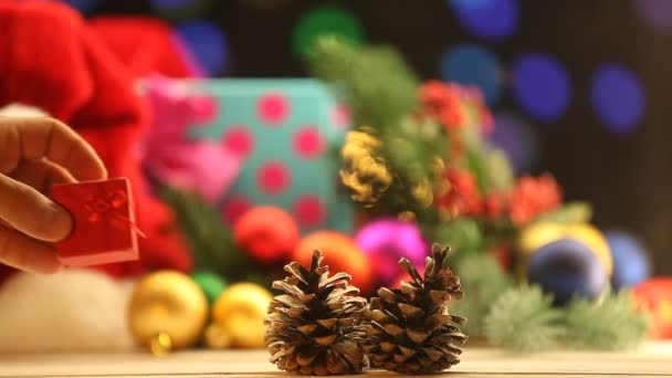 Gift near pine cones — Stock Video