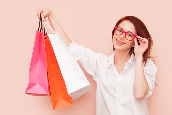 Donna con shopping bags — Foto Stock