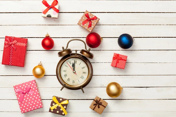 Alalrm-clock and gifts — Stock Photo, Image