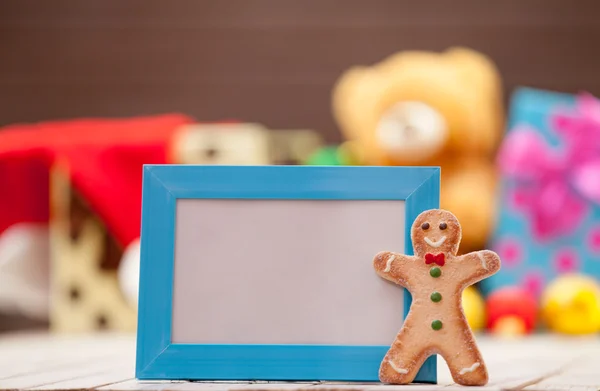 Gingerbread man with blue frame — Stock Photo, Image