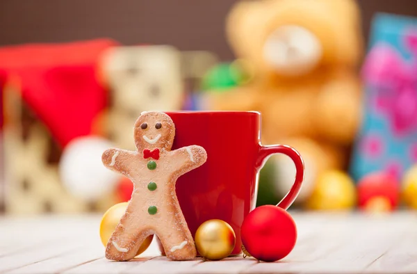 Cup with gingerbread man — Stock Photo, Image