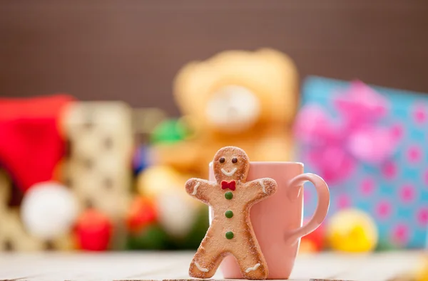 Cup with gingerbread man — Stock Photo, Image