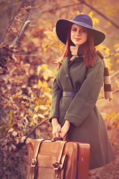 Woman with bag at countryside — Stock Photo, Image