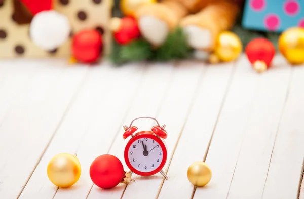 Alarm clock and baubles — Stock Photo, Image