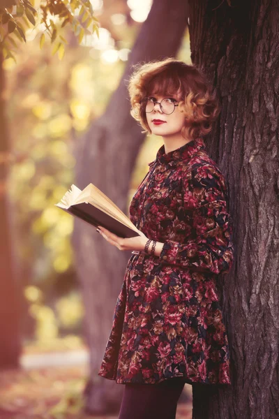 Girl in dress with book — Stock Photo, Image