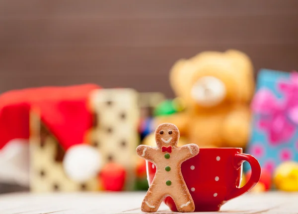 Cup with gingerbread man — Stock Photo, Image