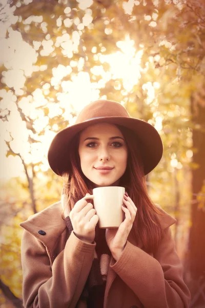 Woman in coat with hat — Stock Photo, Image