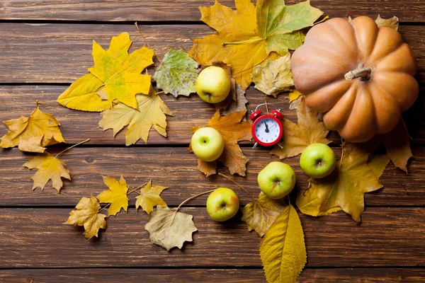 Aalrm clock and pumpkin — Stock Photo, Image