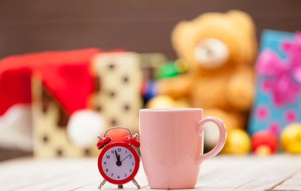 Alarm clock and cup — Stock Photo, Image