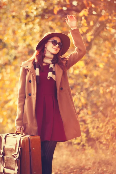 Woman with bag in autumn — Stock Photo, Image