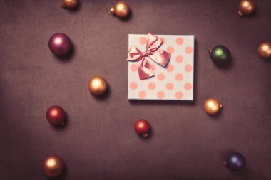 Christmas gift box and baubles