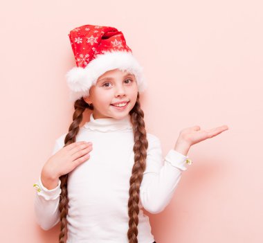 Noel Baba şapkalı pigtails kız