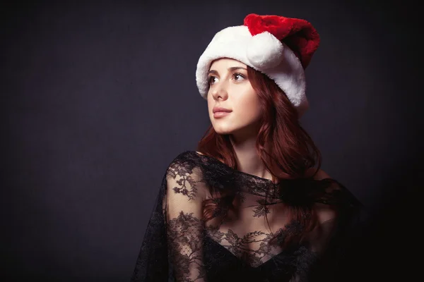 Woman in Santa Claus hat — Stock Photo, Image