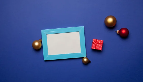 Christmas gifts and photo frame — Stock Photo, Image