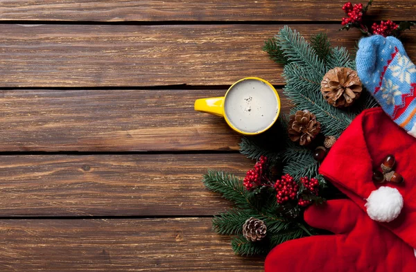 Christmas gifts and cup of coffee — Stock Photo, Image