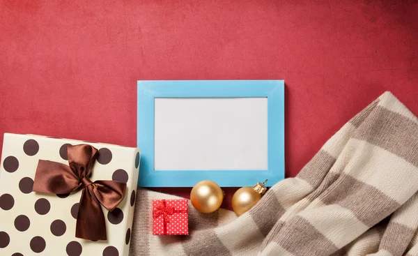 Photo frame and christmas gifts — Stock Photo, Image