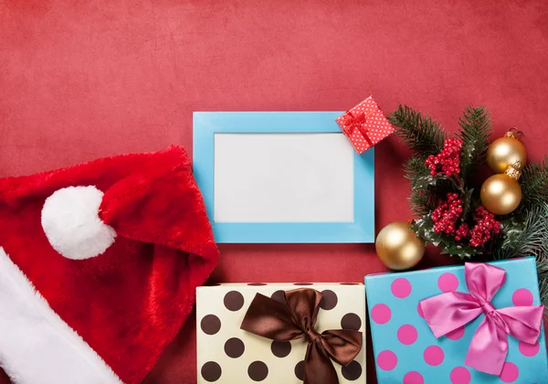 Photo frame and christmas gifts — Stock Photo, Image