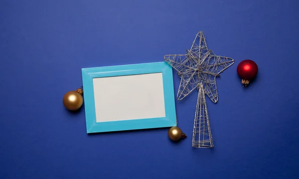Photo frame and christmas toy — Stock Photo, Image