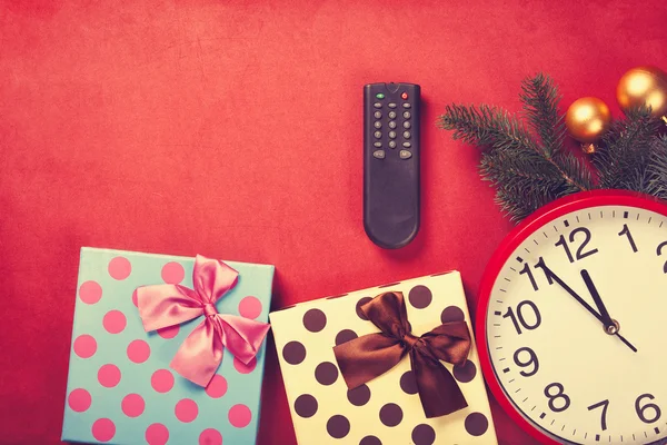 TV remote and christmas gifts — Stock Photo, Image