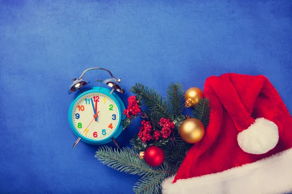 Clock with christmas tree branch — Stock Photo, Image