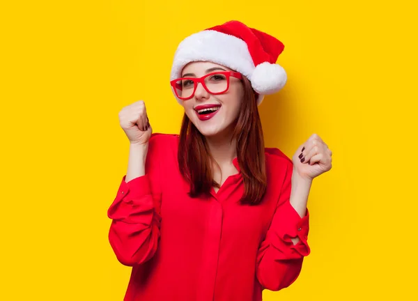 Mujer en santa claus sombrero — Foto de Stock