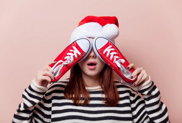 Woman with gumshoes — Stock Photo, Image