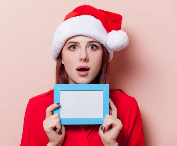 Woman with photo frame — Stock Photo, Image