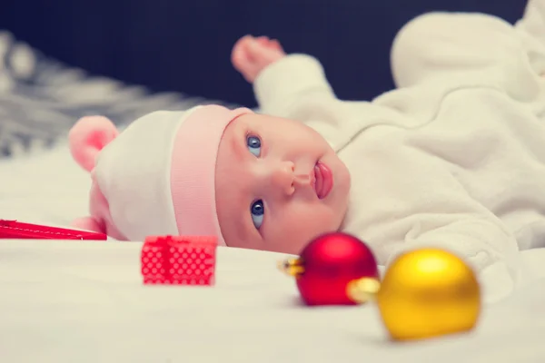 Baby with christmas gifts — Stock Photo, Image