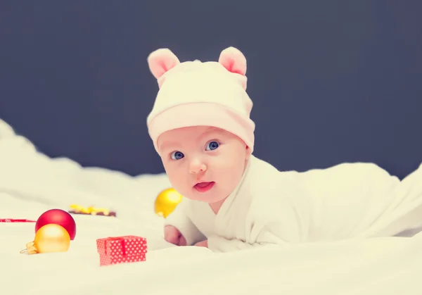 Baby with christmas gifts — Stock Photo, Image