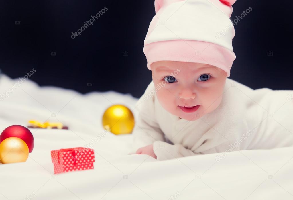 baby with christmas gifts