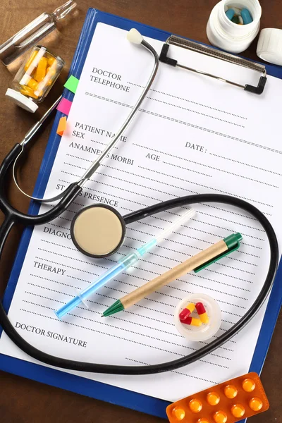 Stethoscope and clipboard — Stock Photo, Image