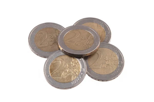 Moedas de euro num fundo branco simples . — Fotografia de Stock
