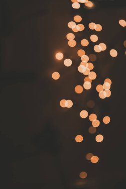 Koyu arkaplanda güzel turuncu arka plan şenlik ışığı efekti