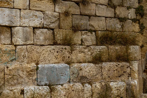 beautiful wall background with an old ancient stone structure close-up