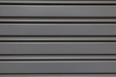 Güzel, ilginç, orijinal gri metal arka plan yakın plan.