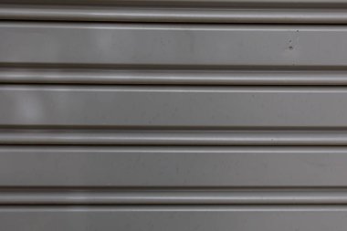 Güzel, ilginç, orijinal gri metal arka plan yakın plan.