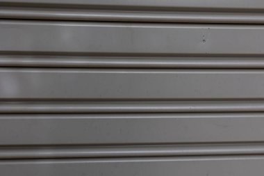 Güzel, ilginç, orijinal gri metal arka plan yakın plan.