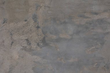 Kırık alçılı, eski gri duvarın güzel arka planı.