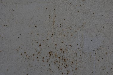 Kırık alçılı, eski gri duvarın güzel arka planı.