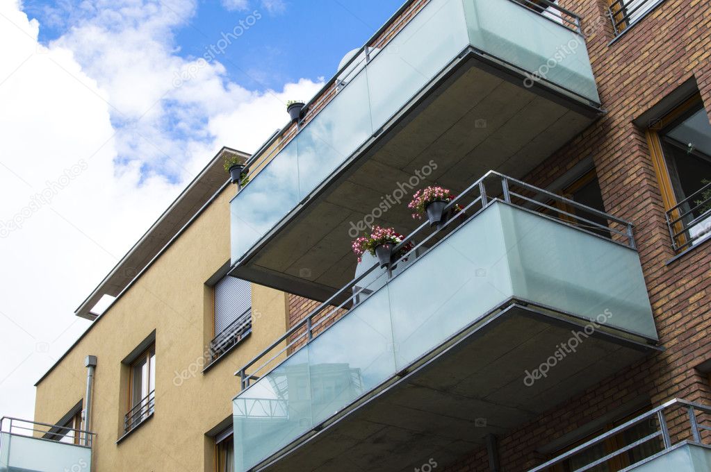 Modern house with beautiful glass balconies 