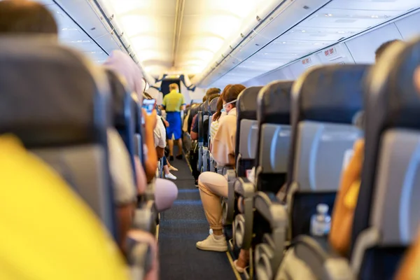 Aircraft Cabin Corridor Seats Passengers Flight Stock Photo