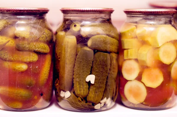 Various canning vegetables in glass jar — Stock Photo, Image