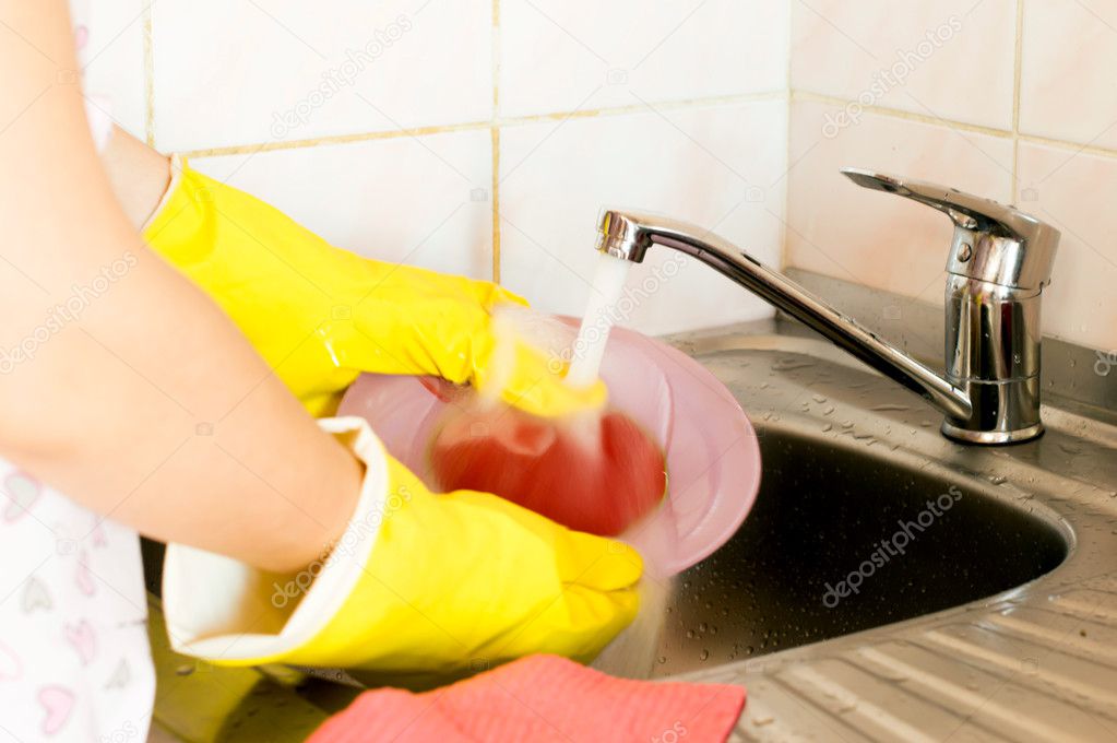 Process of washing of ware — Stock Photo © gorvik 56432427