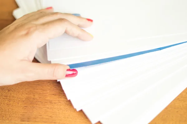 The process of turning white office paper — Stock Photo, Image