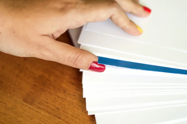 The process of turning white office paper — Stock Photo, Image