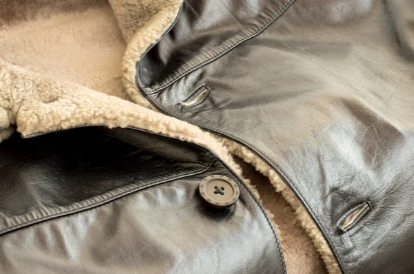 Leather natural sheepskin coat of black color — Stock Photo, Image