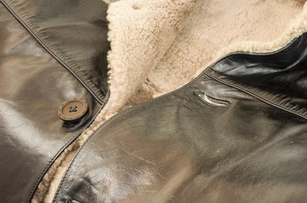 Leather natural sheepskin coat of black color — Stock Photo, Image